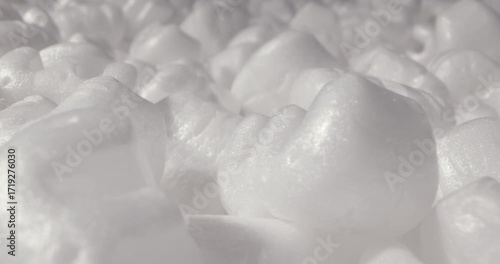 Foam plastic white packaging filler in the form of numbers, environmental pollution, waste problems