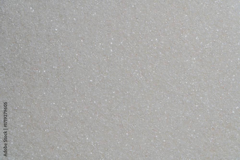 Obraz premium White granulated sugar on background, top view, closeup. The concept of unhealthy eating, obesity, heart disease, diabetes