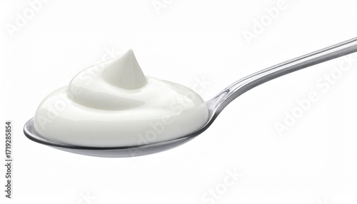Metallic spoon holding thick white dollop of yogurt or sour cream, smooth texture with peak, isolated on plain white background.