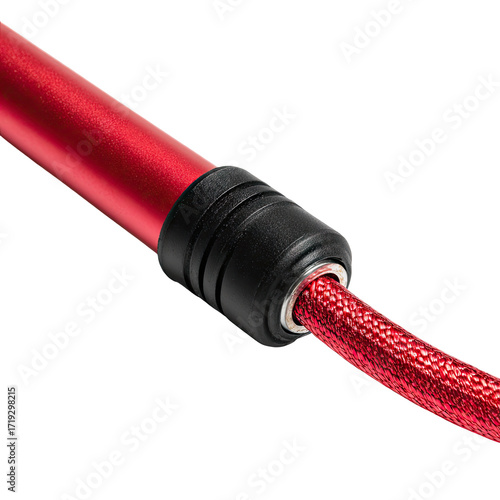 Close-up of red skipping rope handle and cord
