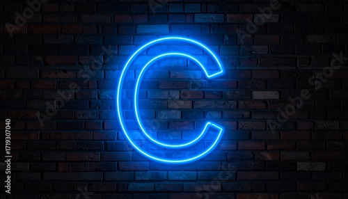 Neon letter C on brick wall