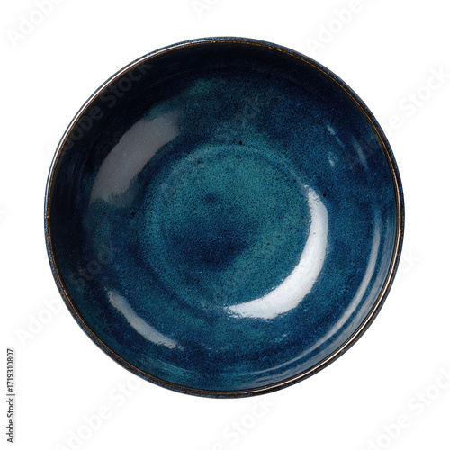 Deep, round, navy blue bowl with swirling, glazed pattern