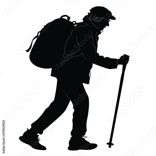 Silhouette of an elderly hiker with a backpack and walking stick