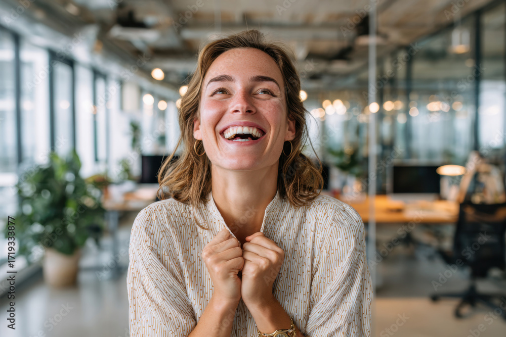Fototapeta premium Smiling woman in modern office space