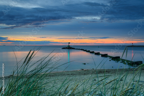 Fototapeta Naklejka Na Ścianę i Meble -  Sunset over the Baltic Sea beach in Gorki Zachodnie, Gdansk. Poland