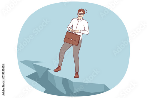 Challenge for business man standing at edge of abyss, blindfolded, and in need of help of guide. Problem of commercial helplessness and lack of information to overcome challenge or crisis