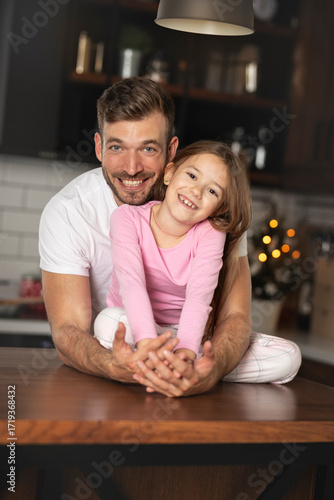 Multi-generation family together prepare food
