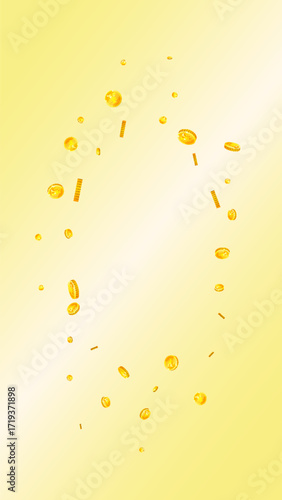 Chinese yuan coins falling. Scattered gold CNY