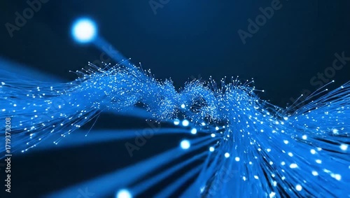 Close-up of glowing blue fiber optic cables against a dark background