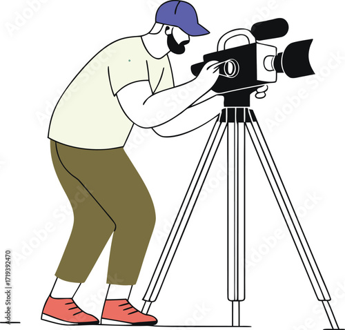 Man filming with a video camera on a tripod