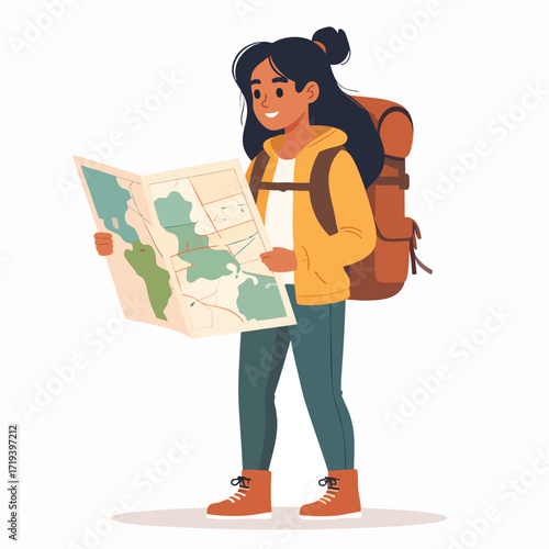 Smiling young woman backpacker studying a paper map, planning her adventure.