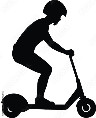 Silhouette of a person riding an electric scooter