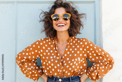 Woman in chocolate brown polka dot shirt and dark blue wide-leg jeans, stylish casual outfit, perfect for fashion blogs, social media, lookbooks, and e-commerce content.