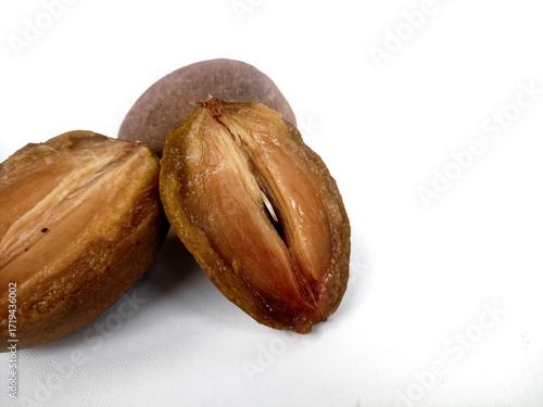Buah sawo or Manilkara zapota, commonly known as sapodilla, sapota, chikoo isolated on white Background 