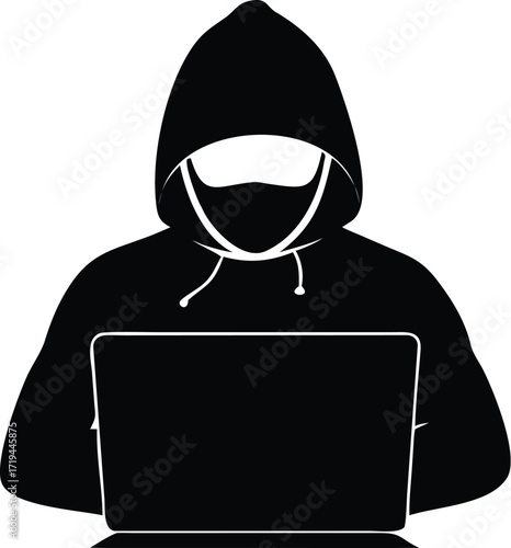 A criminal hacker wearing a mask uses a laptop to steal data, a cybercrime thief committing technology fraud