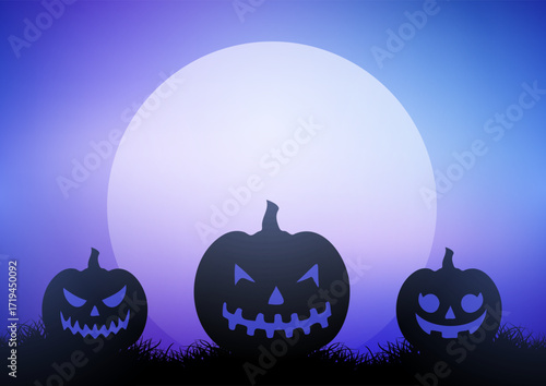 Halloween background with Jack O lanterns against moonlit sky 