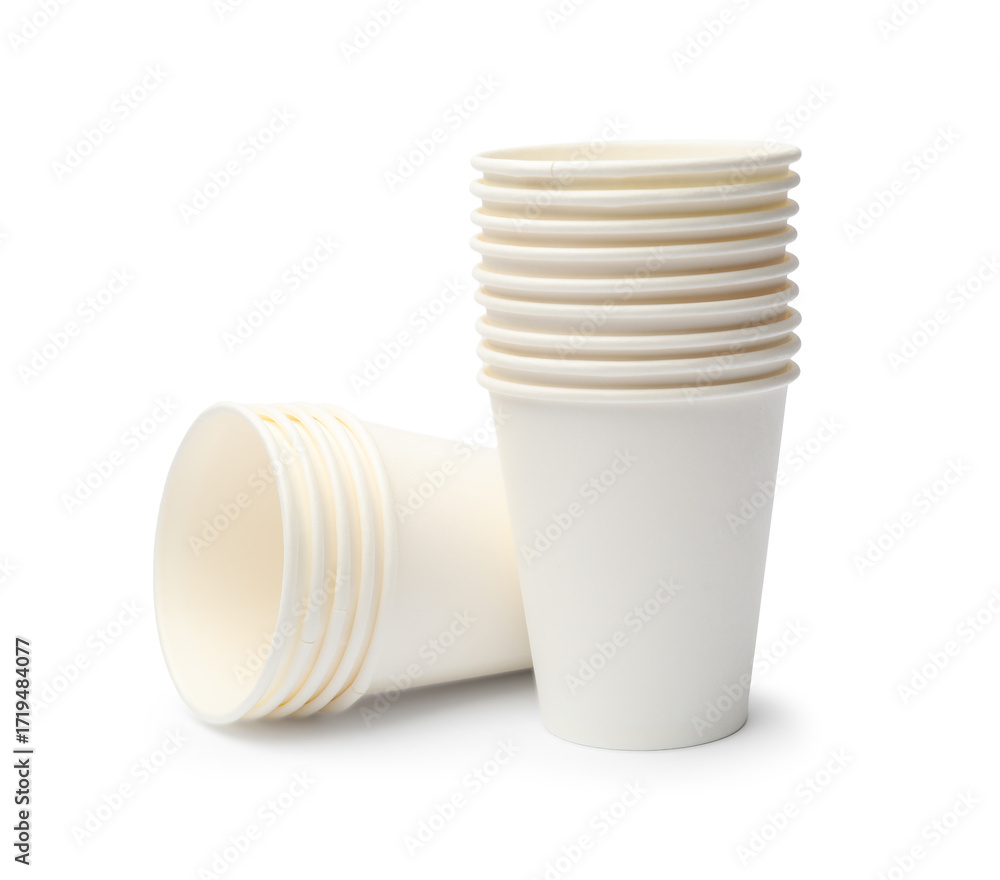 Obraz premium Disposable tableware. Stacks of paper cups isolated on white