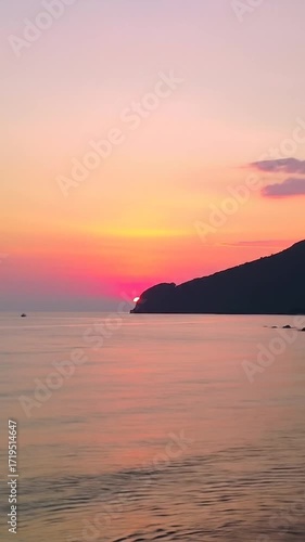 Wallpaper Mural Ocean sunset with silhouetted headland Torontodigital.ca