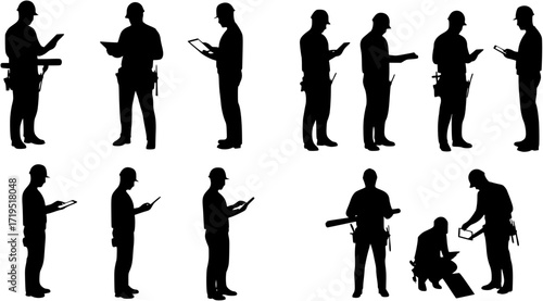 Silhouette of a Construction Worker Holding a Tablet
