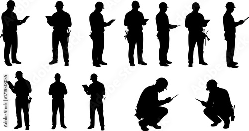 Silhouette of a Construction Worker Holding a Tablet
