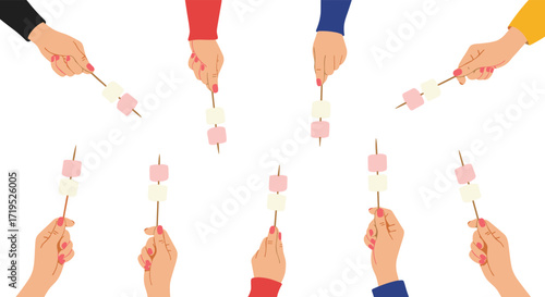 A collection of hands holding skewers with marshmallows for a sweet snack.