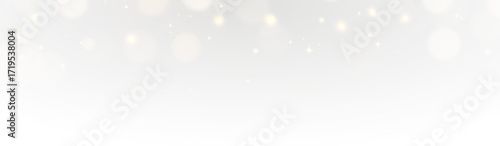 Sparkling stardust and radiant golden glitter with luminous particles, twinkling confetti, and festive magic light, abstract holiday Christmas card illustration.