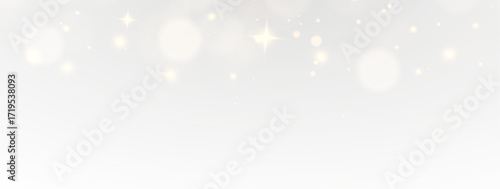Glittering stardust with radiant golden particles, twinkling confetti, magical light, luminous festive effects for abstract Christmas card illustration.