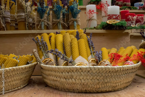Christmas wax candles with lavender in a basket