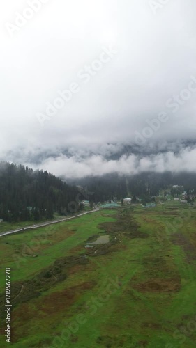 clouds over the mountains drone shot gulmarg