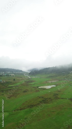 Gulmarg kashmir landscape with fog and clouds