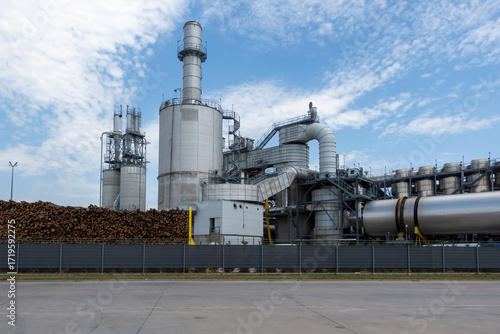 Exterior view of the piping of industrial wood processing plant. Filters, cyclones in industrial dust extraction systems.