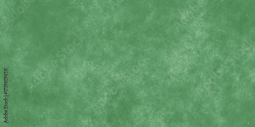 Abstract Elegant dark green background with mottled vintage texture in old fancy background design, texture of colored parchment paper.