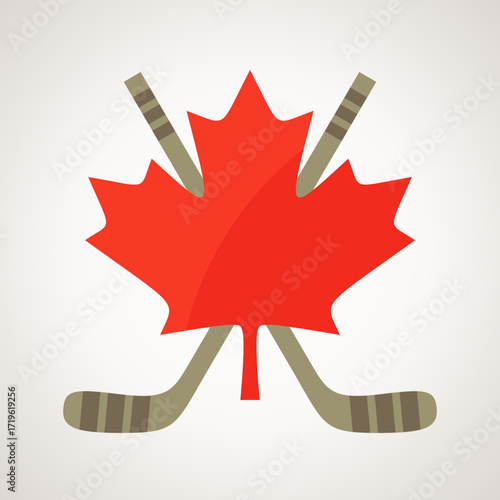 Canadian red maple leaf and crossed hockey sticks.