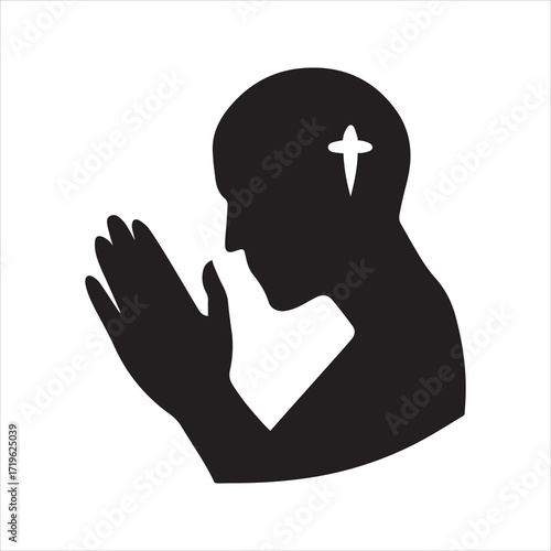 Silhouette of a person praying with a cross in their head