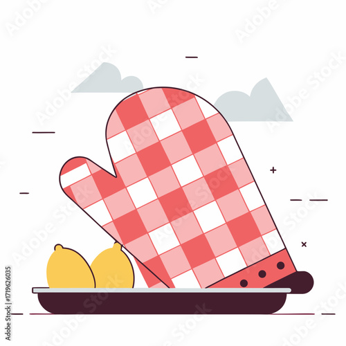Brightly colored oven mitt with fresh lemons on a tray against a light sky background in a cozy kitchen setting
