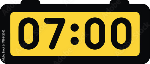 Digital alarm clock displaying seven o clock