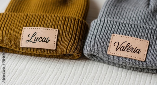 Two Personalized Knit Beanies with Names Lucas and Valria Closeup
