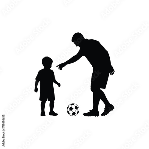 Father and son silhouettes playing soccer with ball concept of world cup 
