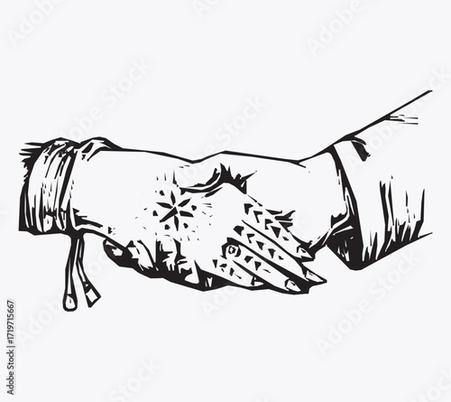 Close up of two hands shaking, showing henna tattoo on one hand, representing greeting and agreement
