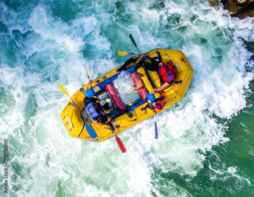 Aerial view of a yellow raft navigating rapids