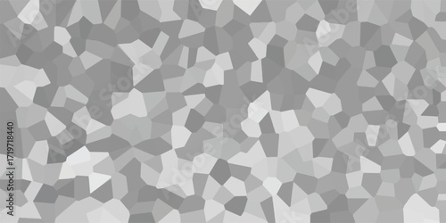Abstract geometric mosaic pattern with varying shades of gray and white creating a textured, crystalline background for design applications