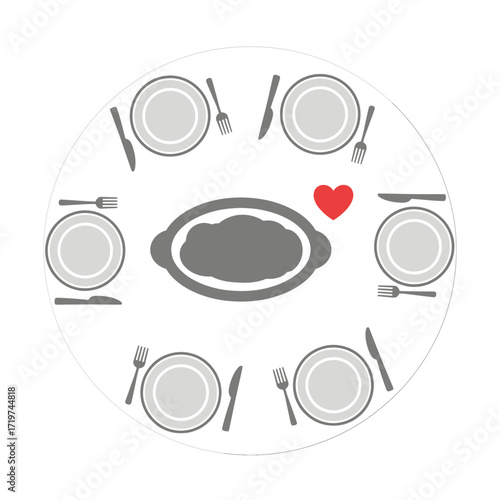 Family dinner around a round table with a main dish.