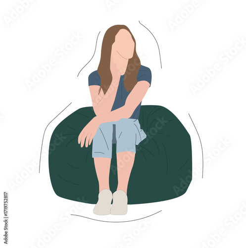 A young woman enjoys a cozy, woman sitting on beanbag chair