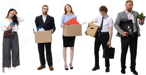 Obraz na płótnie Group of dismissed office employees carrying boxes with sad expressions