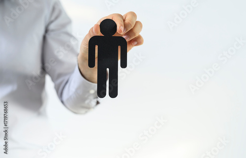 Image of a hand holding a p...