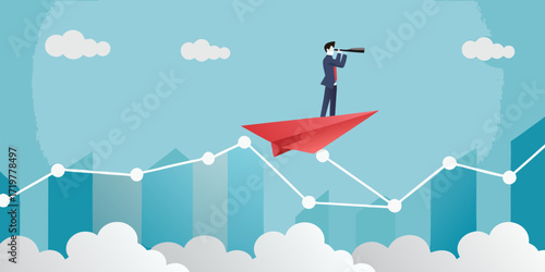 Businessman riding a red paper airplane looking through a telescope over a rising graph and city skyline