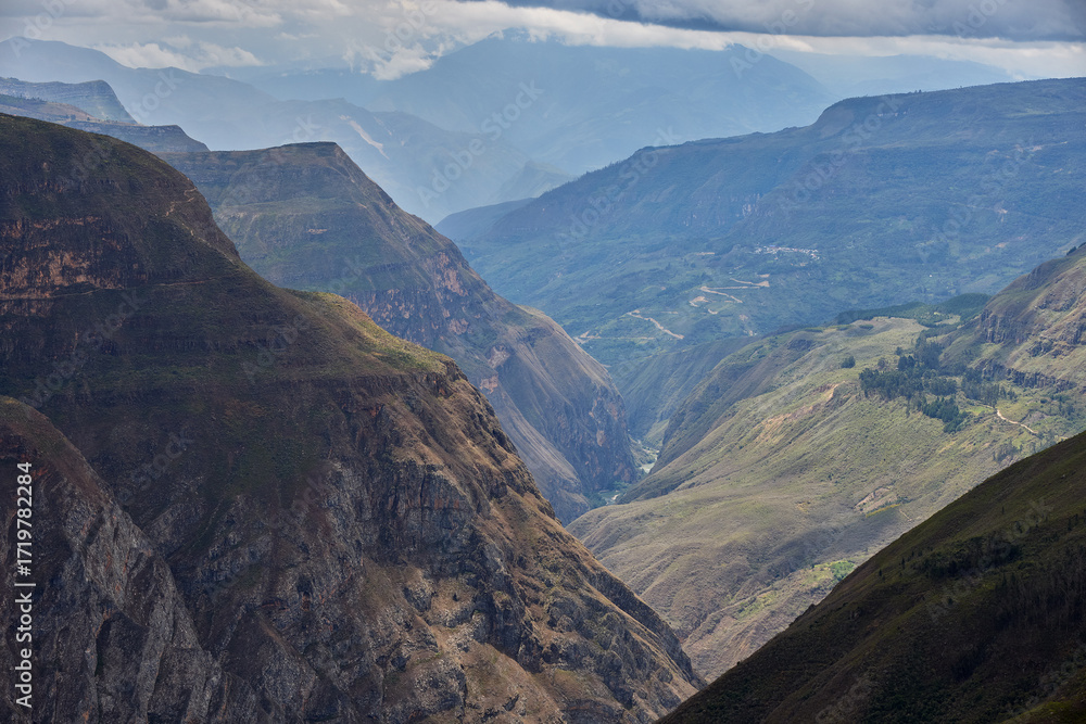 Naklejka premium Mirador of Huanca Urco near Chachapoyas, the view stretches across dramatic canyons and a vast Andean landscape. A sweeping panorama where depth, silence, and grandeur merge, offering a glimpse into t