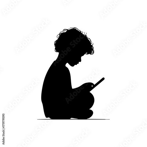 Black silhouette of a curly-haired child sitting cross-legged with a smartphone, symbolizing digital focus, youth screen time, and technology habits.
