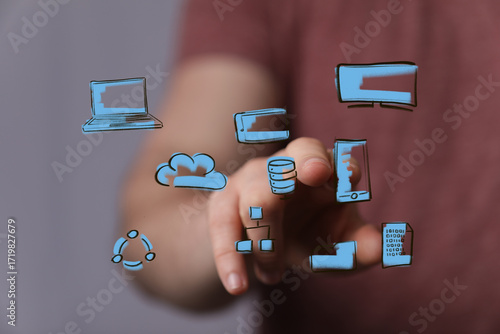 Hand interacts with digital...