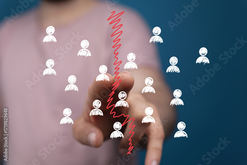 Stock photo depicting conflict, separation, and disagreement within a team.  Ideal for articles on teamwork challenges.